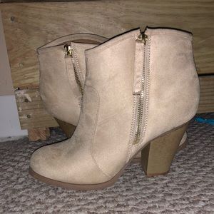 **sold**Tan booties
